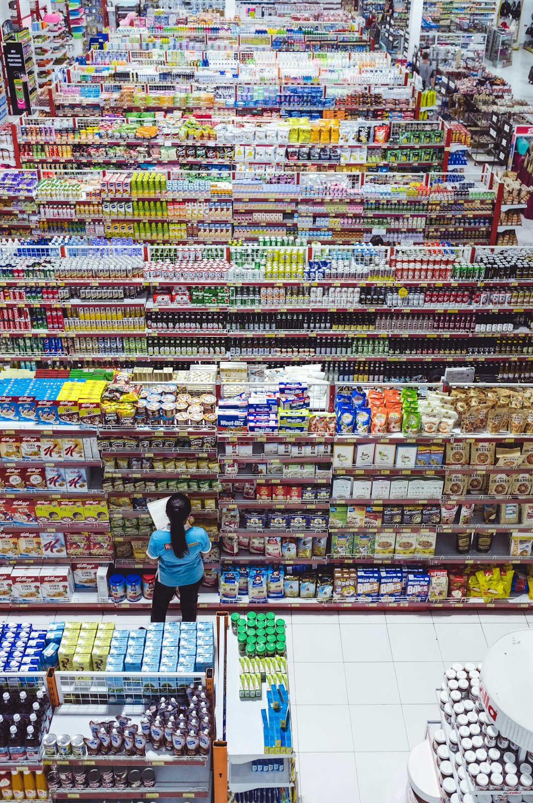 store detective watching customers