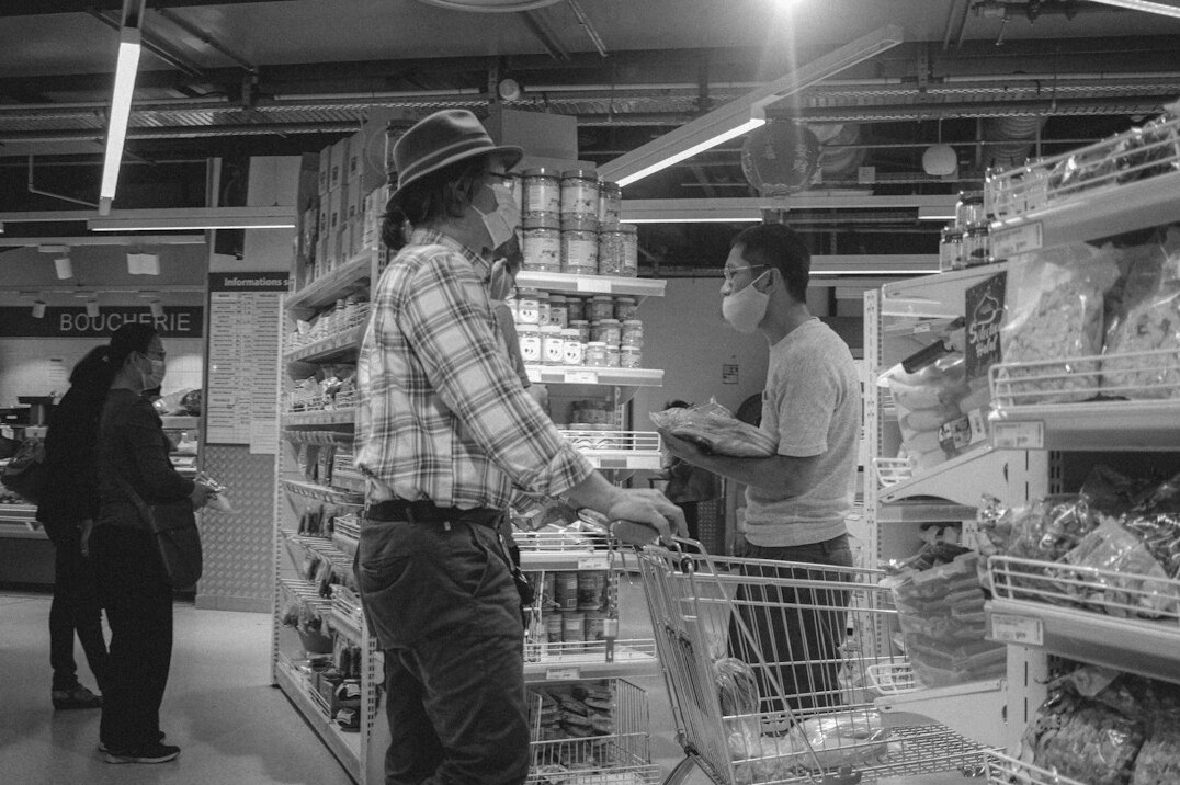store detective observing shoppers