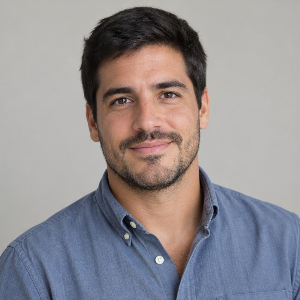 Portrait of a bearded Latino man in a casual shirt