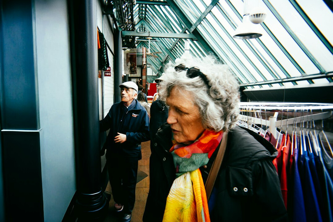 store detective observing shoppers